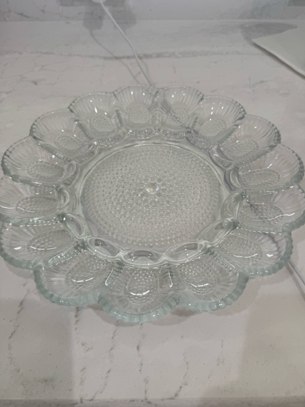 Vintage Indiana Glass deviled egg platter in a clear glass hobnail pattern